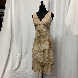 Sleeveless satin textured/layered dress.